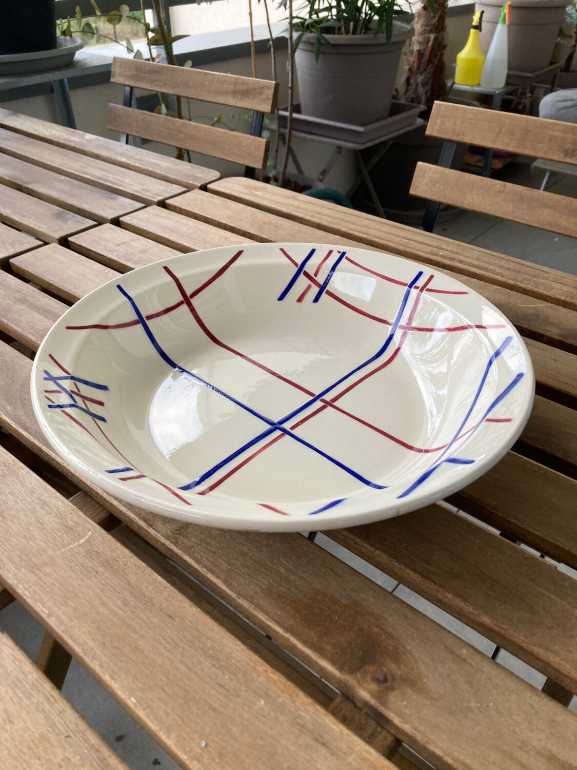 Antique Badonvillier round dish, red and blue intersecting lines