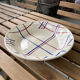 Antique Badonvillier round dish, red and blue intersecting lines
