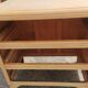 Vintage commode with tapered legs.