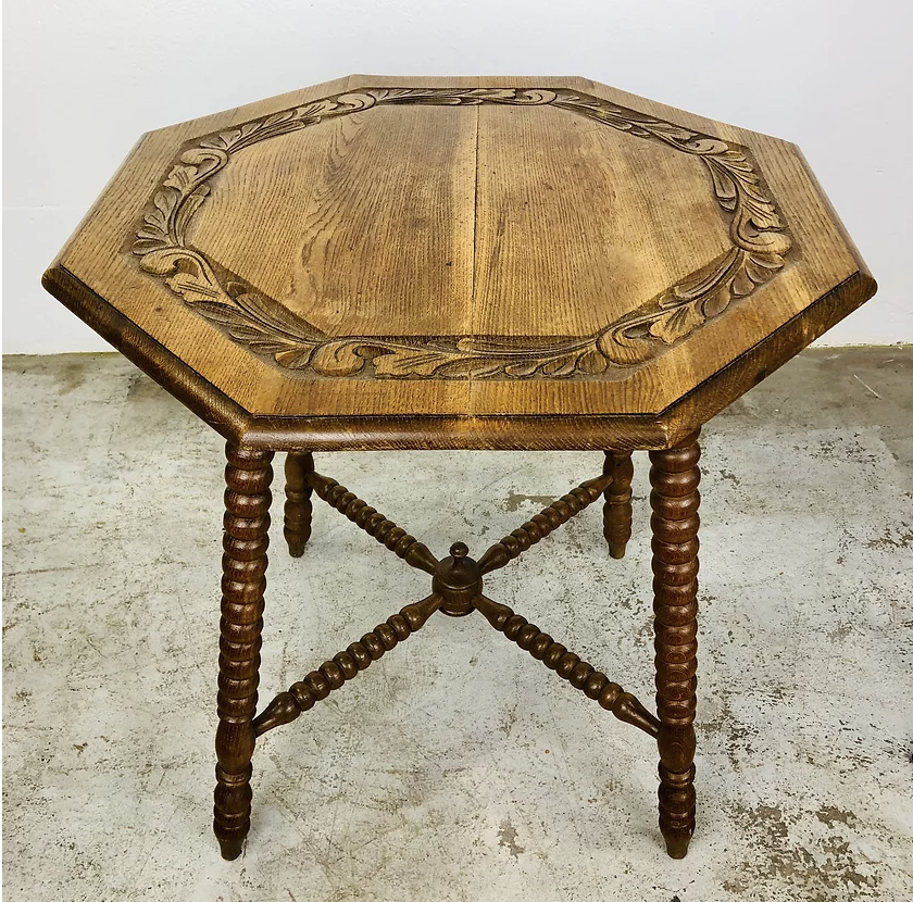 Carved antique wooden table with 8 sides