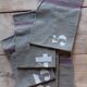 10 numbered khaki tea towels