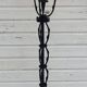 Black wrought iron floor lamp attributed to Gilbert Poillerat