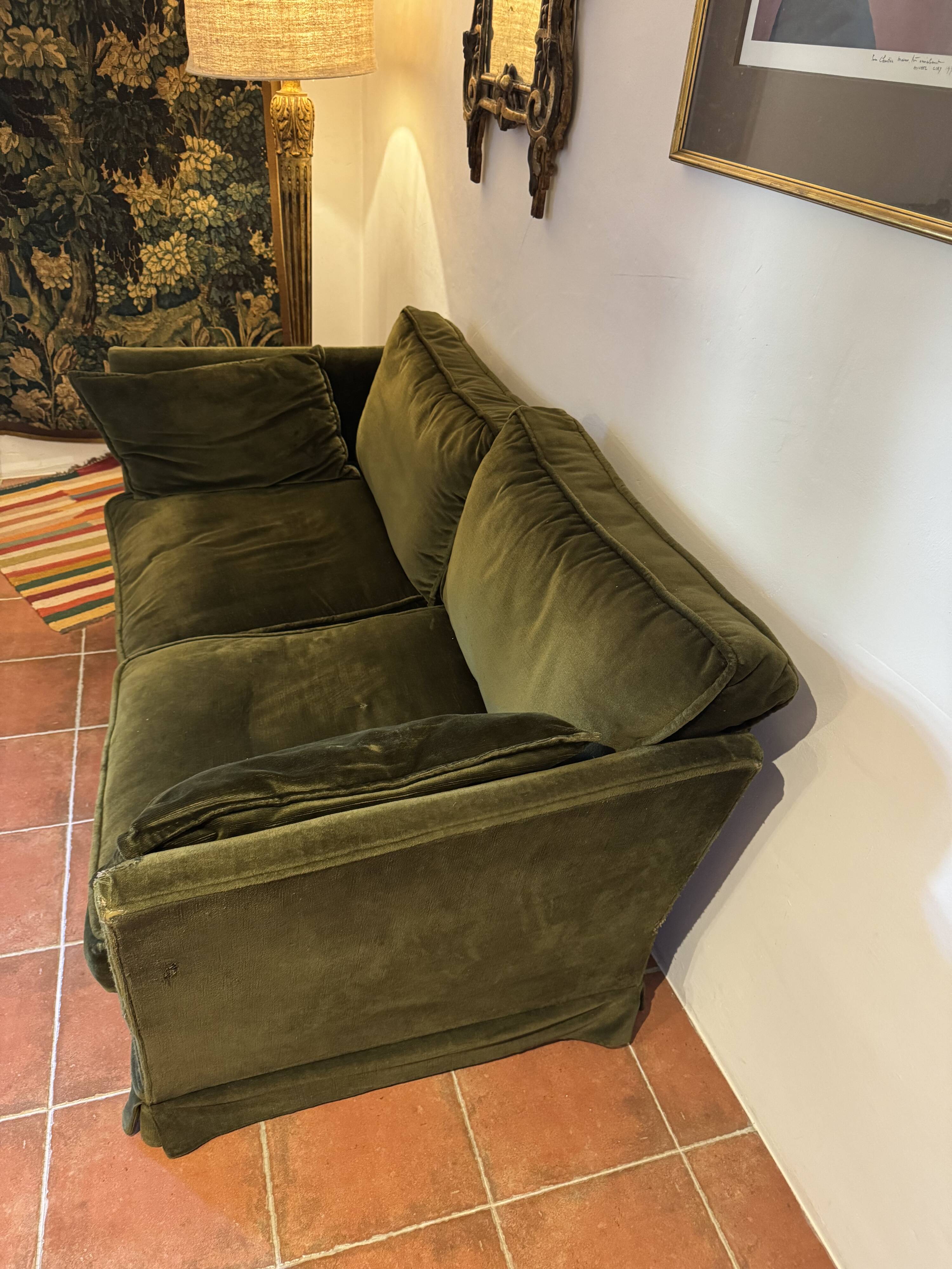 Antique green velvet sofa