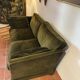 Antique green velvet sofa