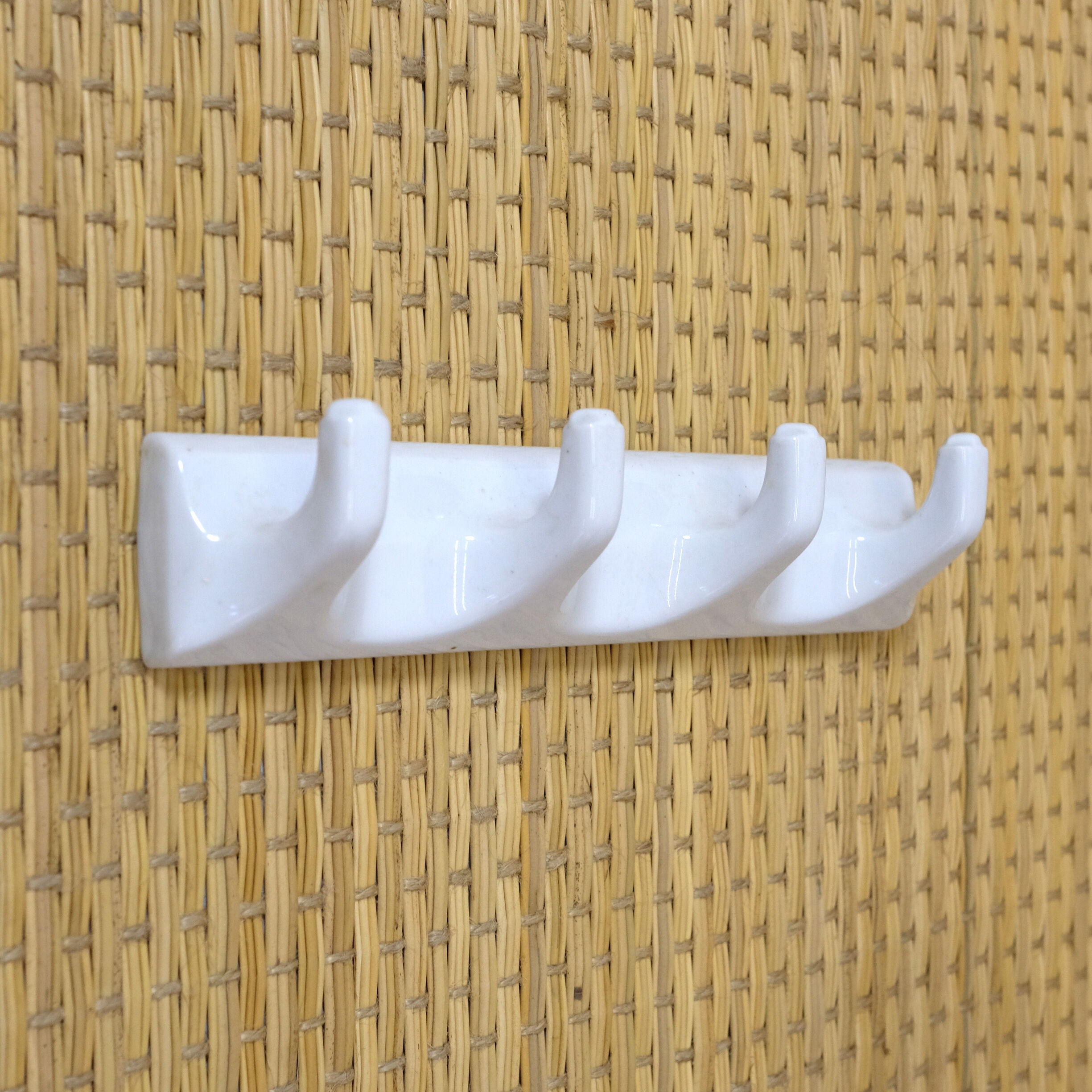 Tea towel holder or porcelain towel with 4 hooks.