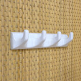 Tea towel holder or porcelain towel with 4 hooks.