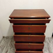 Wooden chest of drawers with a secret drawer