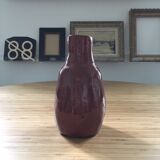 Bottle of chocolate brutalist vase