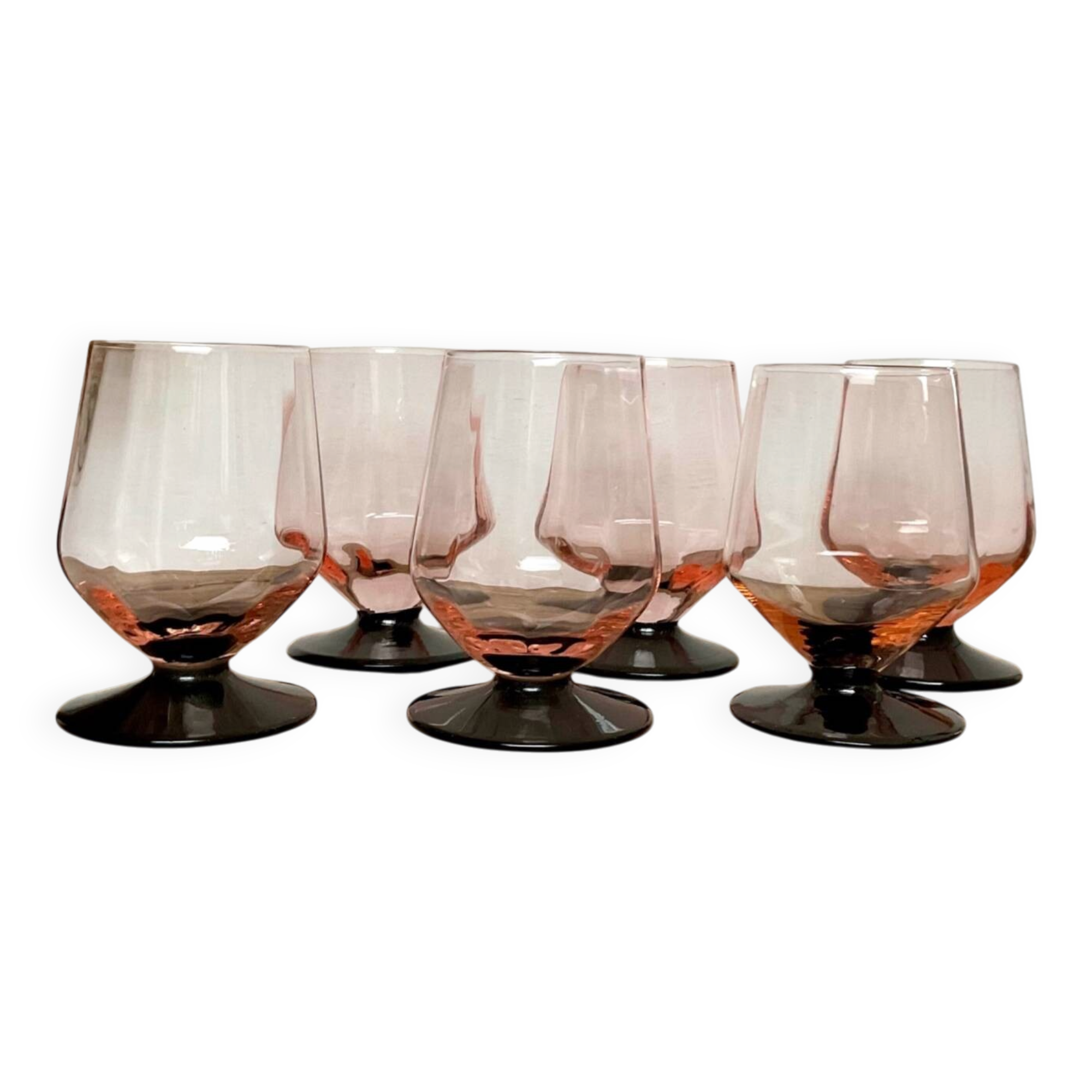 6 small pink glasses with black stems