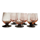 6 small pink glasses with black stems
