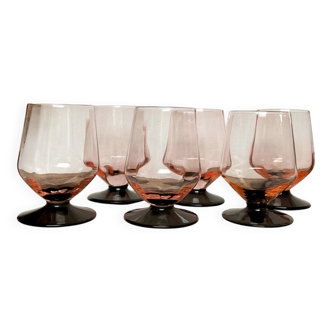 6 small pink glasses with black stems