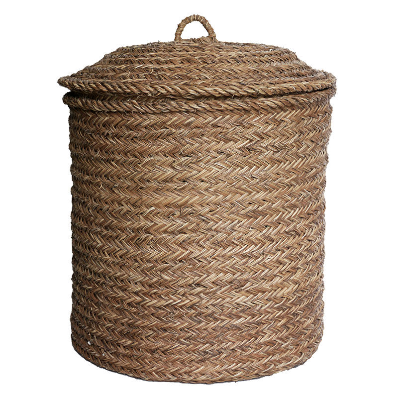 Hand-woven laundry basket in natural rush