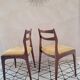 Set of 4 teak chairs with fabric seat in Scandinavian style.