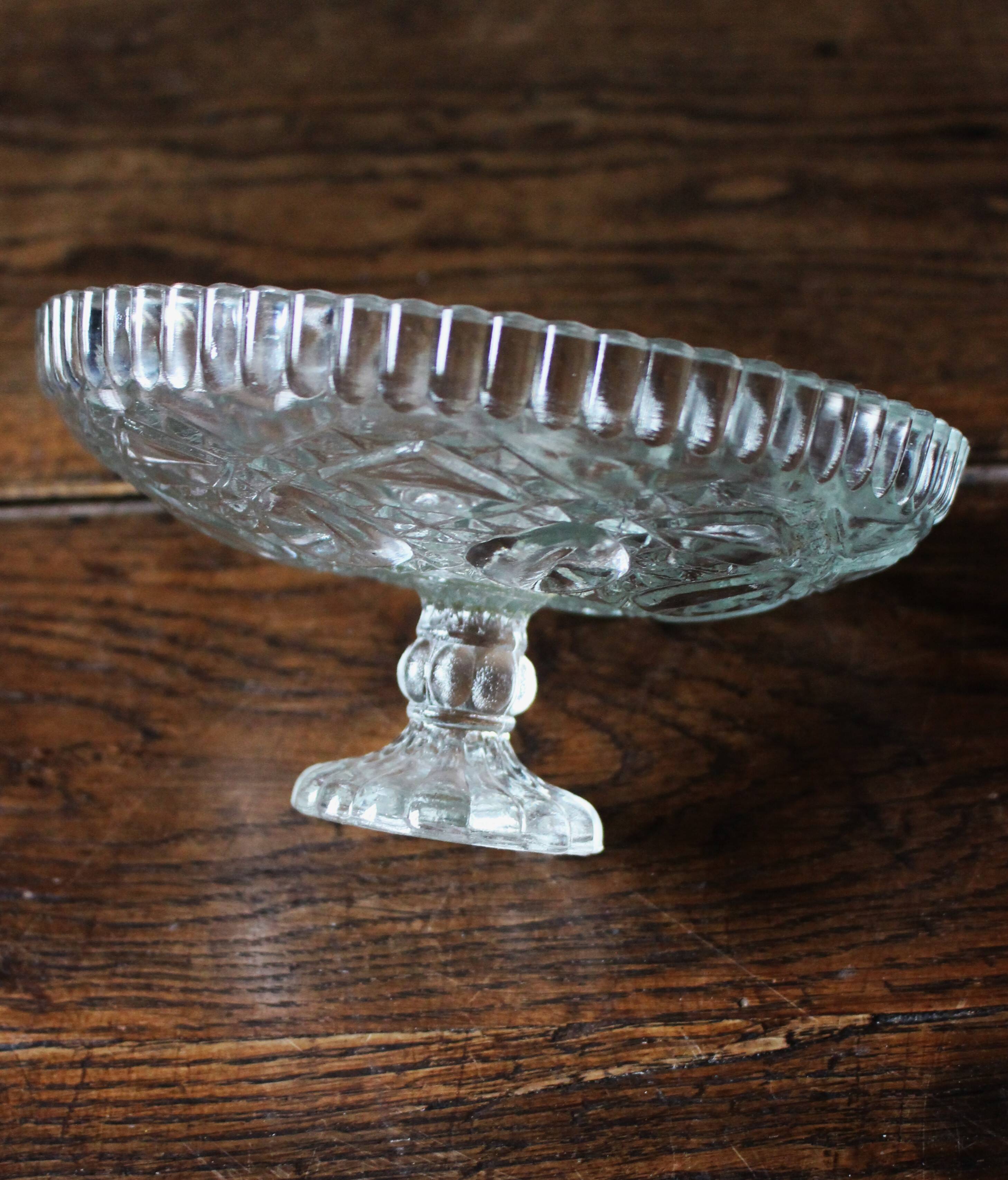 Cut glass goblet with a transparent stem.