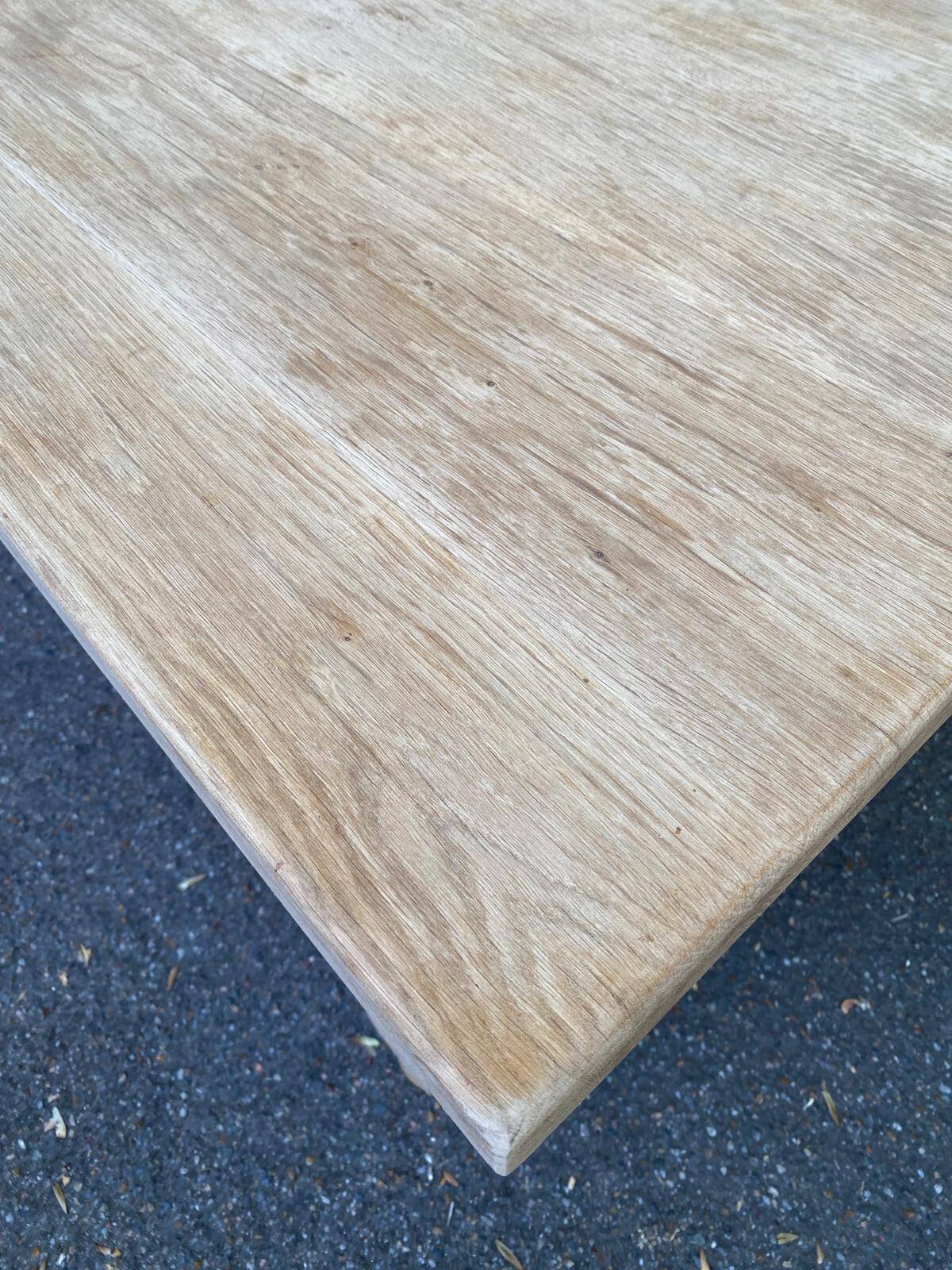 Renovated extendable farmhouse dining table made of solid raw oak from the 1950s.