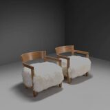 Set of two solid oak and off-white sheepskin chairs, Switzerland, 1970s
