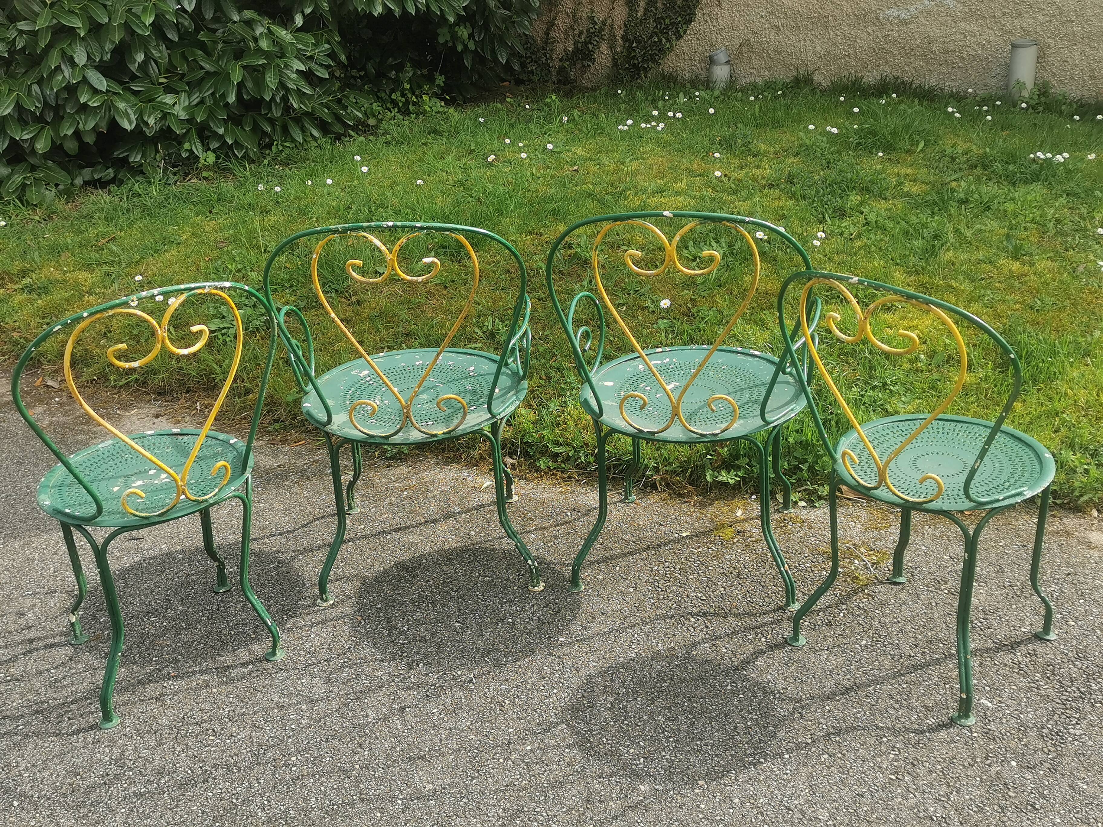 Set of 2 vintage garden chairs and 2 armchairs