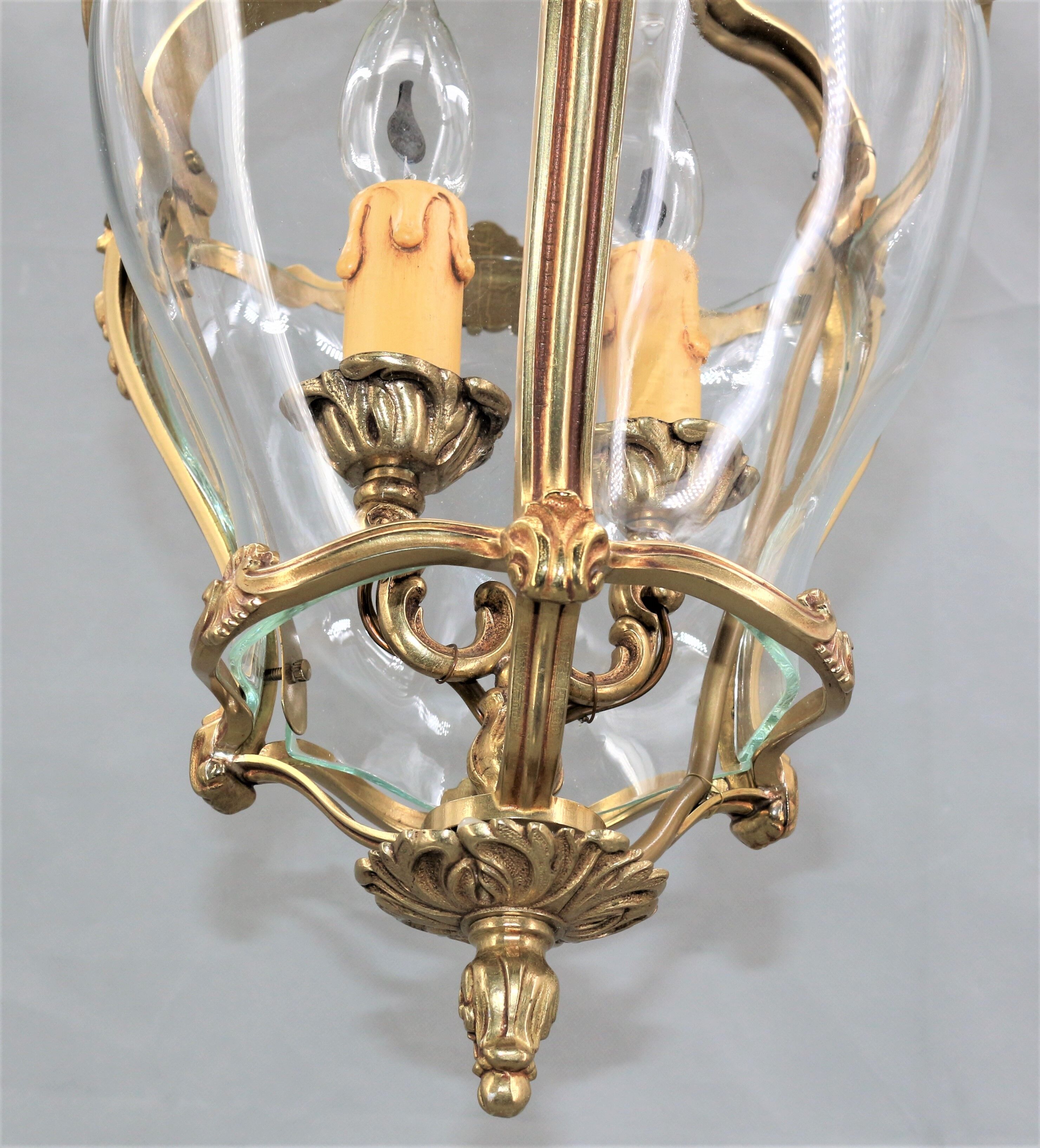 Lustre en bronze et verre bombé