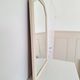 Miroir biseauté et mouluré beige