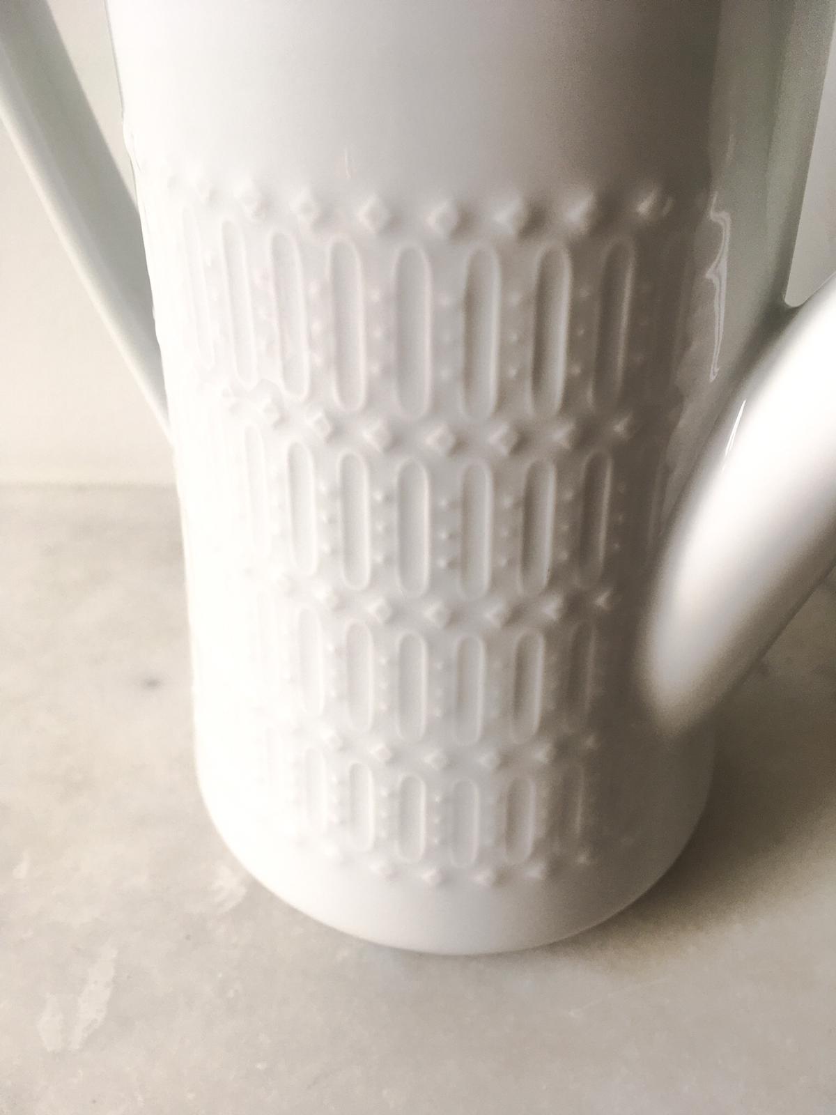 Vintage white porcelain teapot