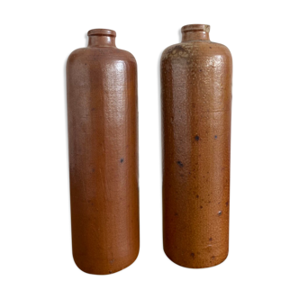 Duo of bottles in ancient sandstone