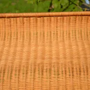 Wrought iron and rattan magazine/newspaper rack