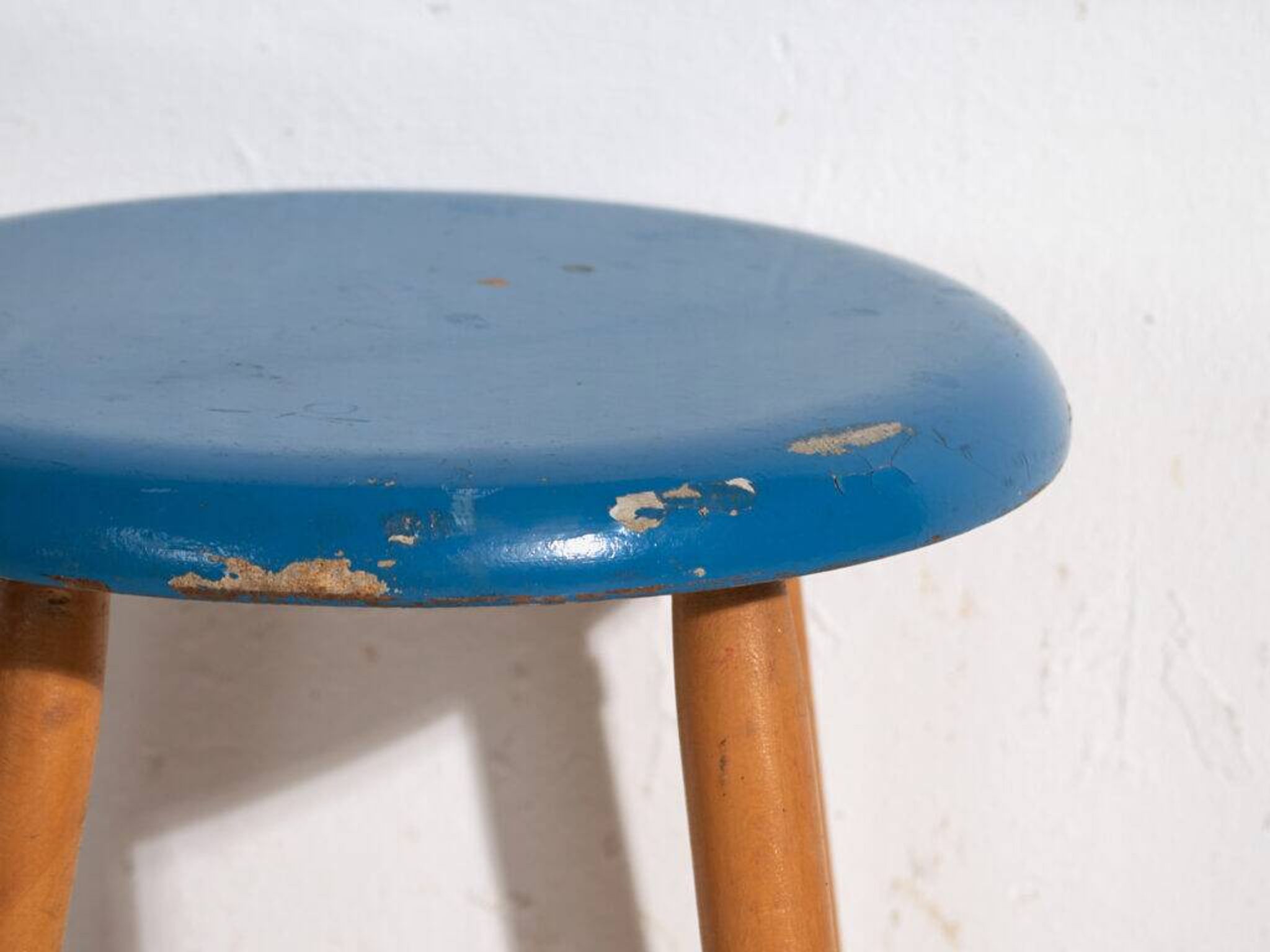 Antique wooden stool with a round seat – Central Europe, around 1950