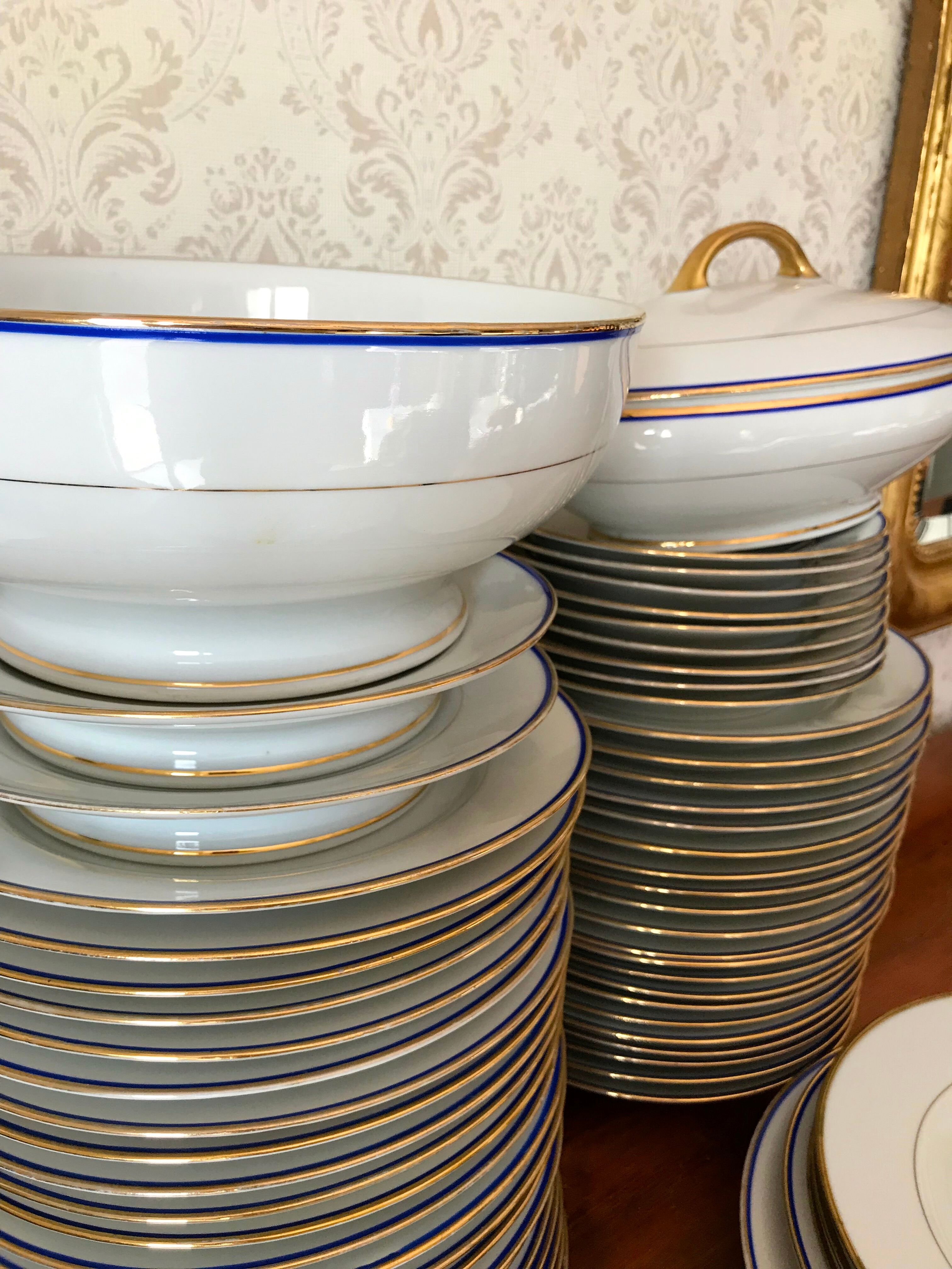table service art deco limoges porcelain white border blue and gold 61 pieces signed