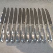 12 silver plated table knives by Argit goldsmith? Art Deco floral bands