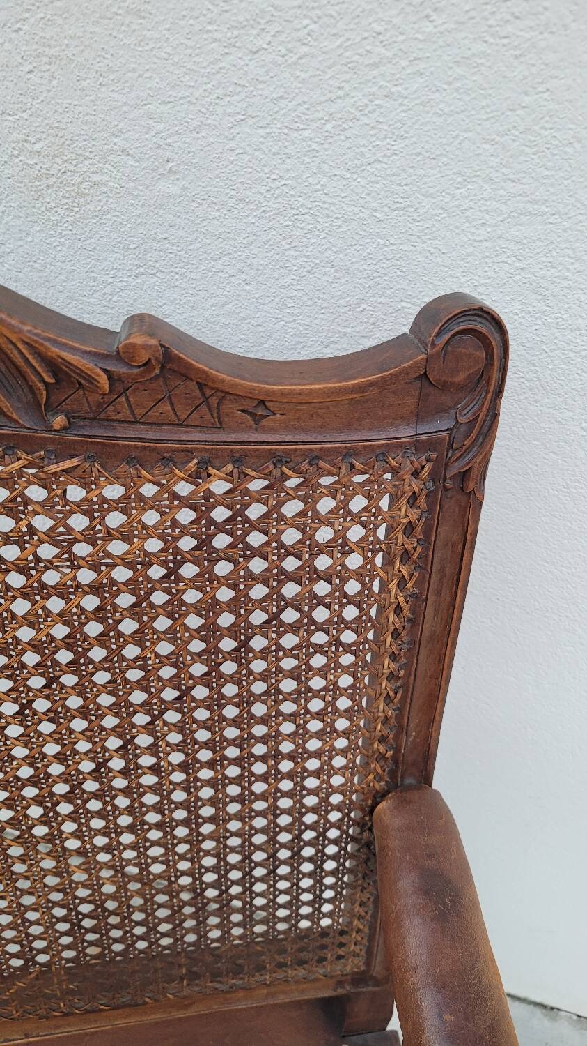 Louis XV Regency cane armchair leather armrests decorated with shell