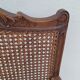 Louis XV Regency cane armchair leather armrests decorated with shell