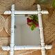 Old bamboo-shaped wooden mirror