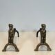 Pair of bronze andirons with seated shamans monogrammed Anton Prinner