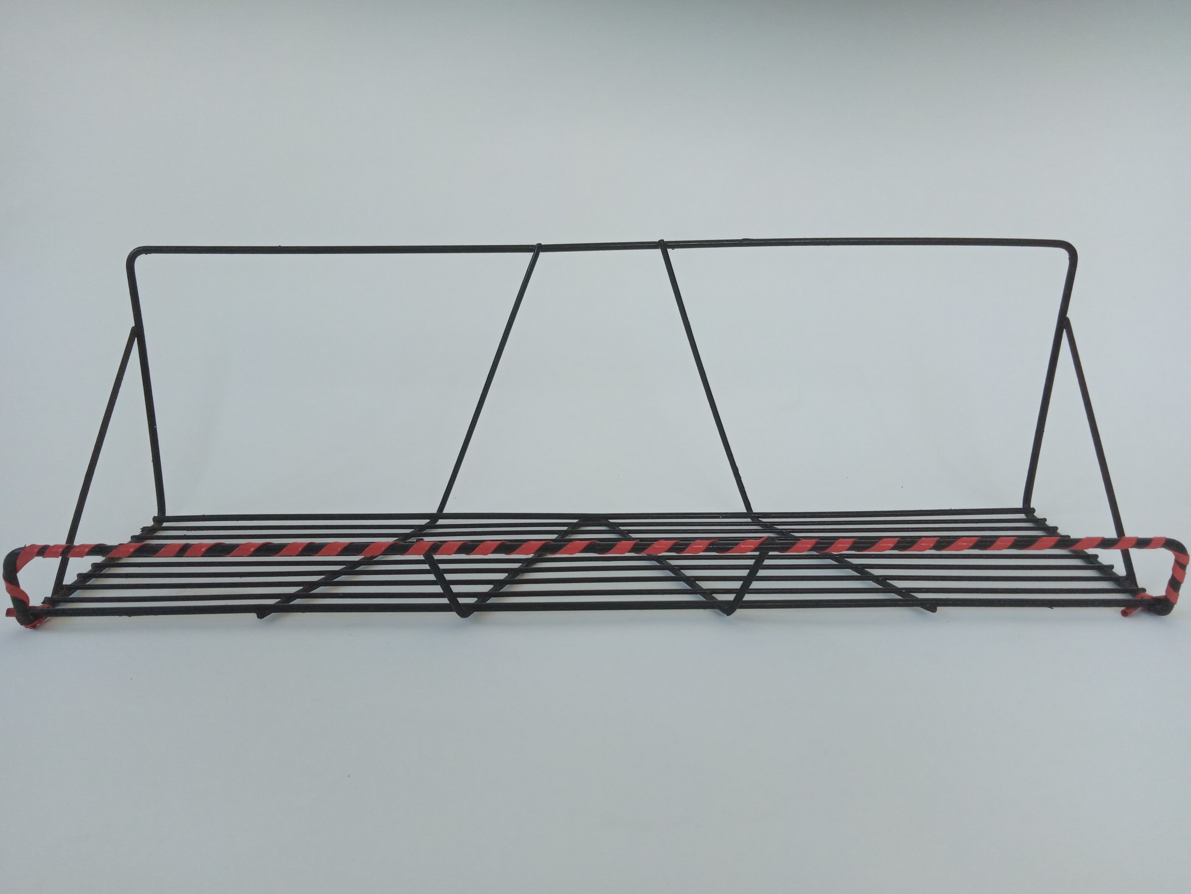 Vintage wall shelf made of metal wire