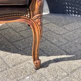 Fauteuil en rotin avec siège en cuir marron