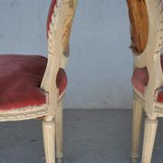 Paire de chaises laquées crème style Louis XVI vers 1900