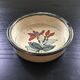 Floral decorated ramekin, signed