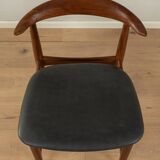 Chaise "corne de vache"  en noyer et similicuir noir