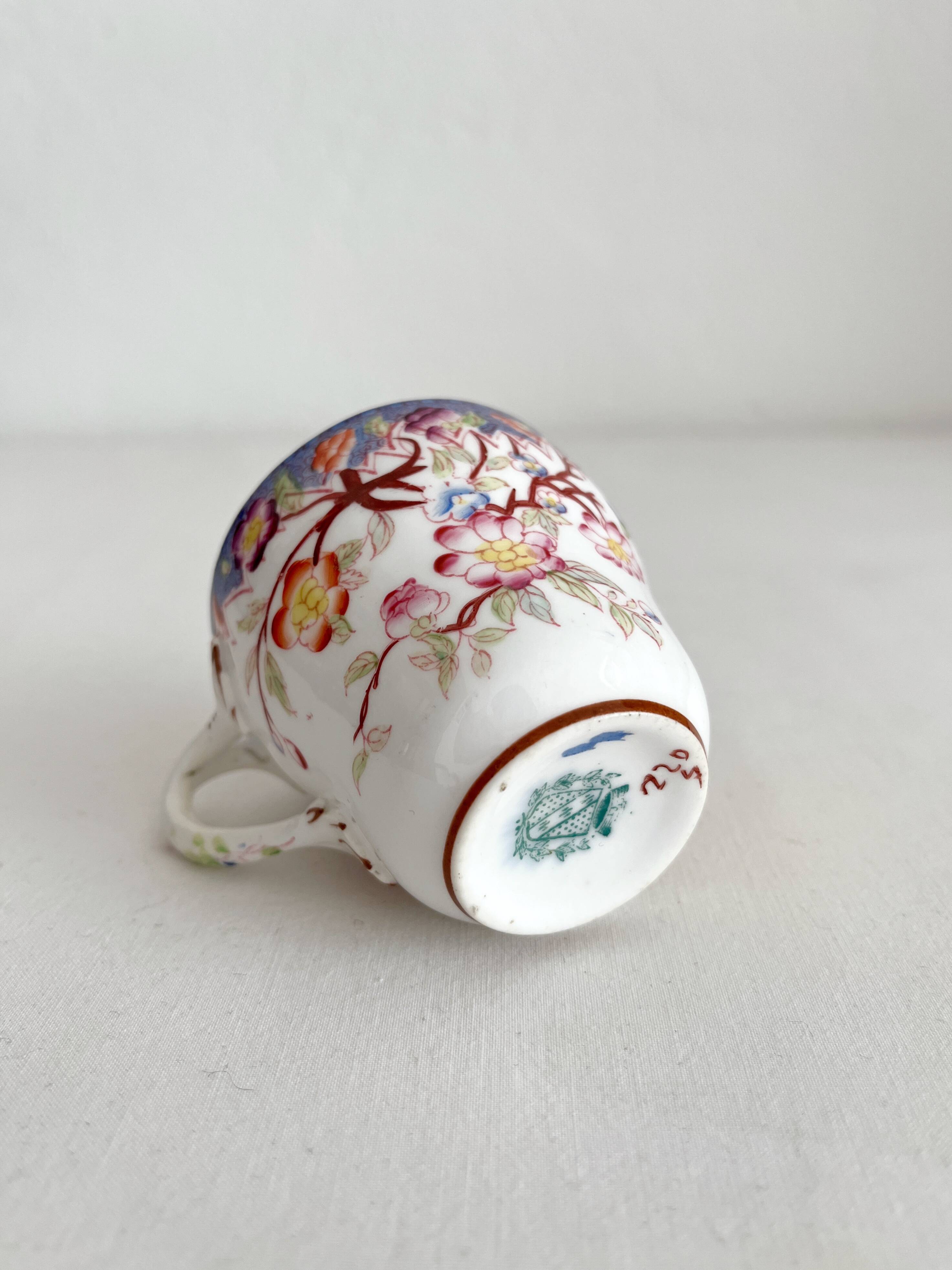 Tasse à café en faïence fine décor Minton Sarreguemines