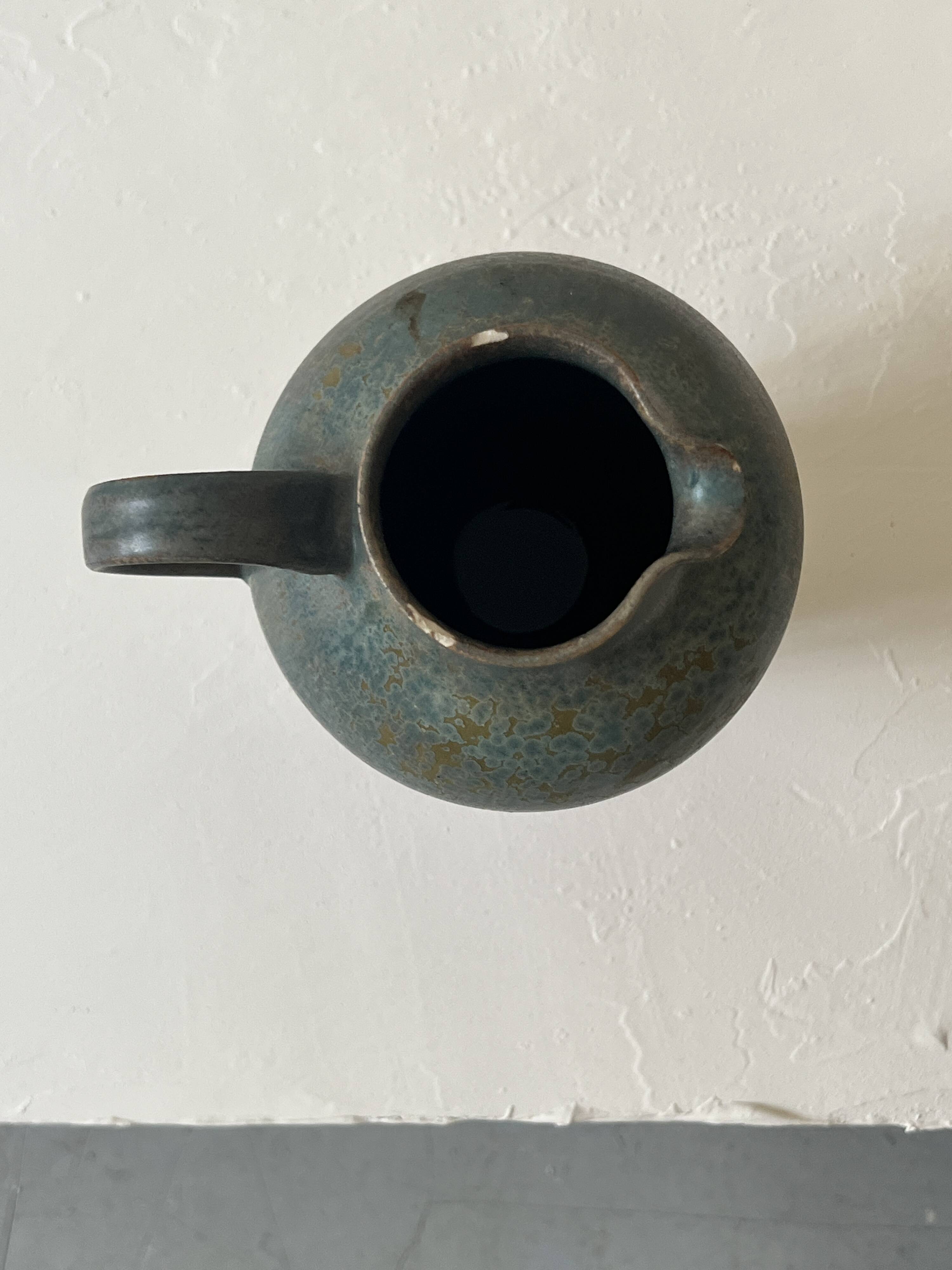 Brownish blue ceramic vase signed AH, France 1950.