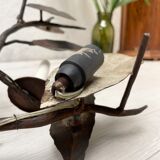 Wall lamp in wrought iron.