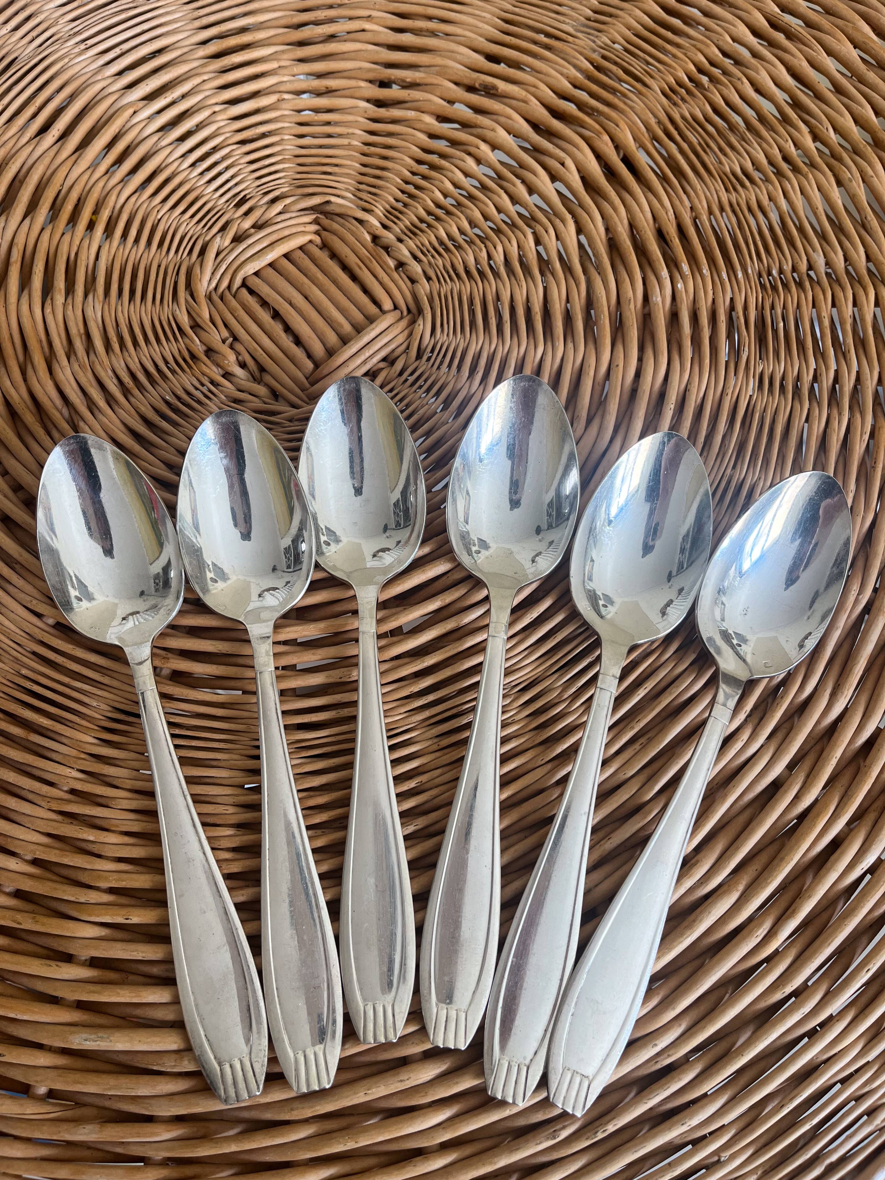 Set of 6 silver metal spoons