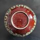 Deep, corrugated, flame-patterned dish