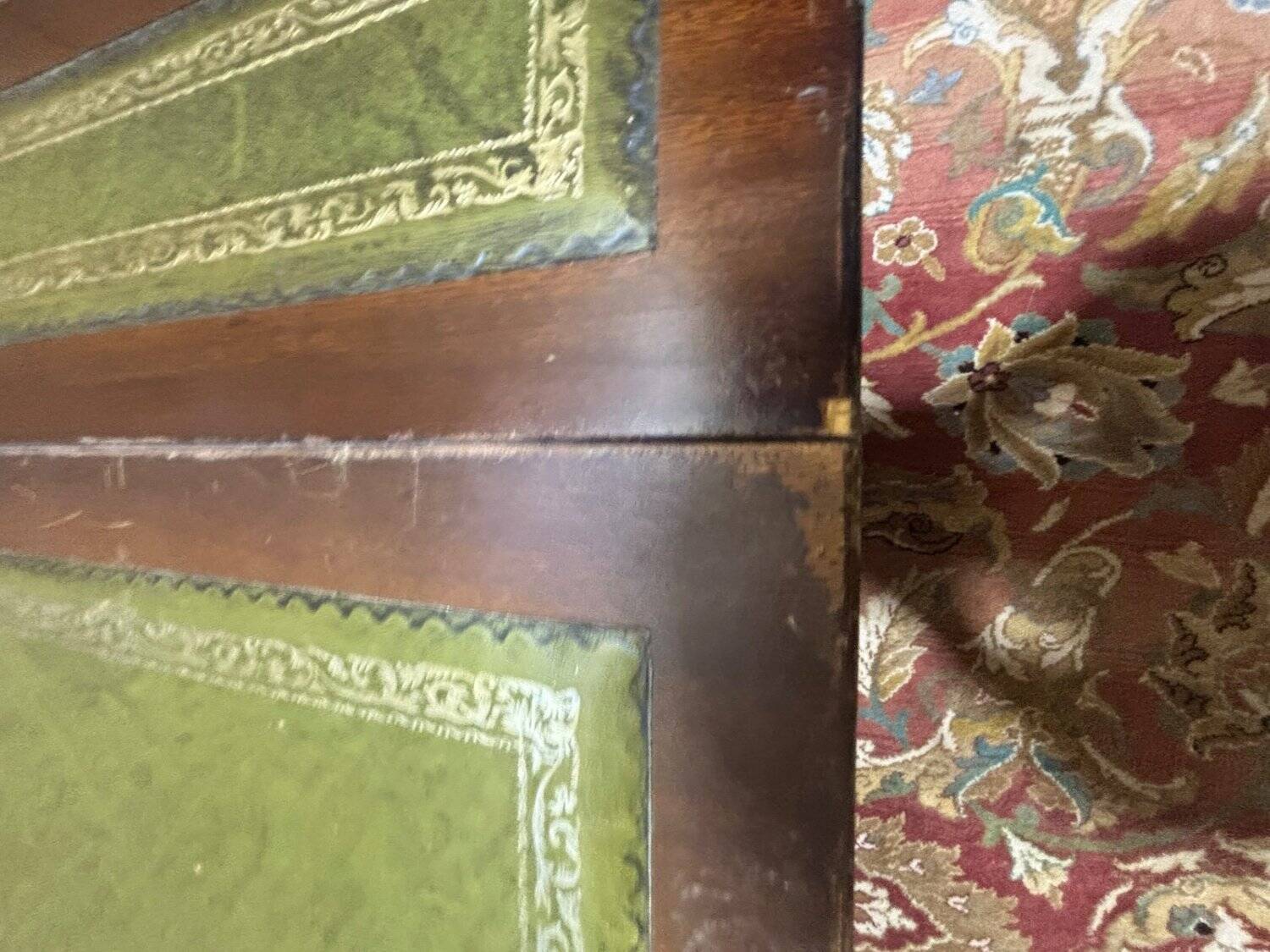 English Regency coffee table, mahogany & green stamped leather with gold.