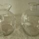 Glassware, including a jug and engraved crystal carafe.