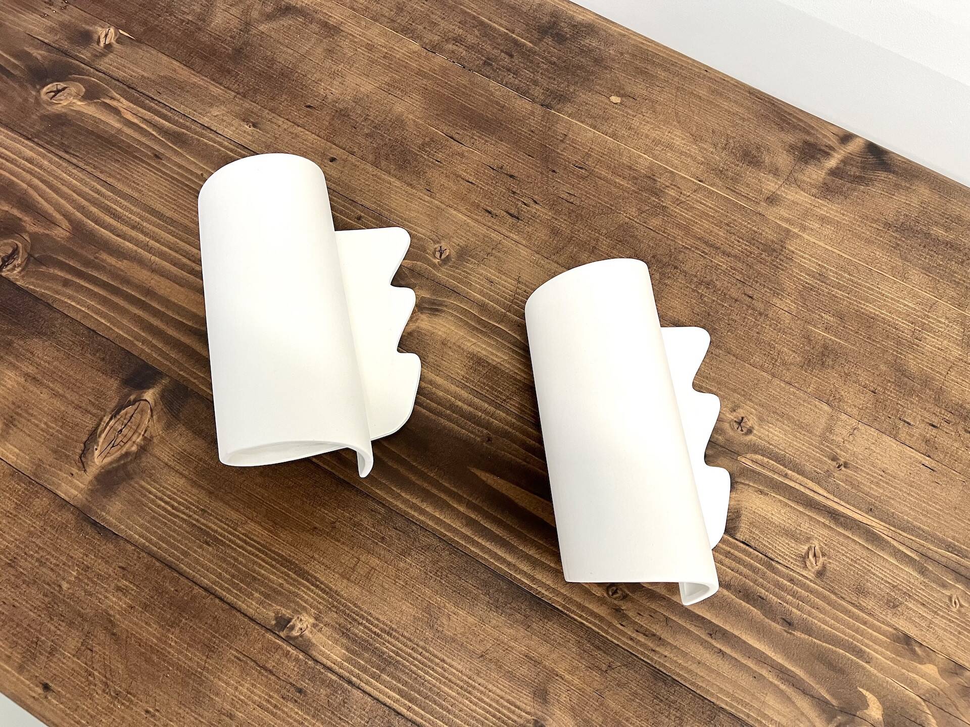 Pair of ceramic wall lights, circa 1990