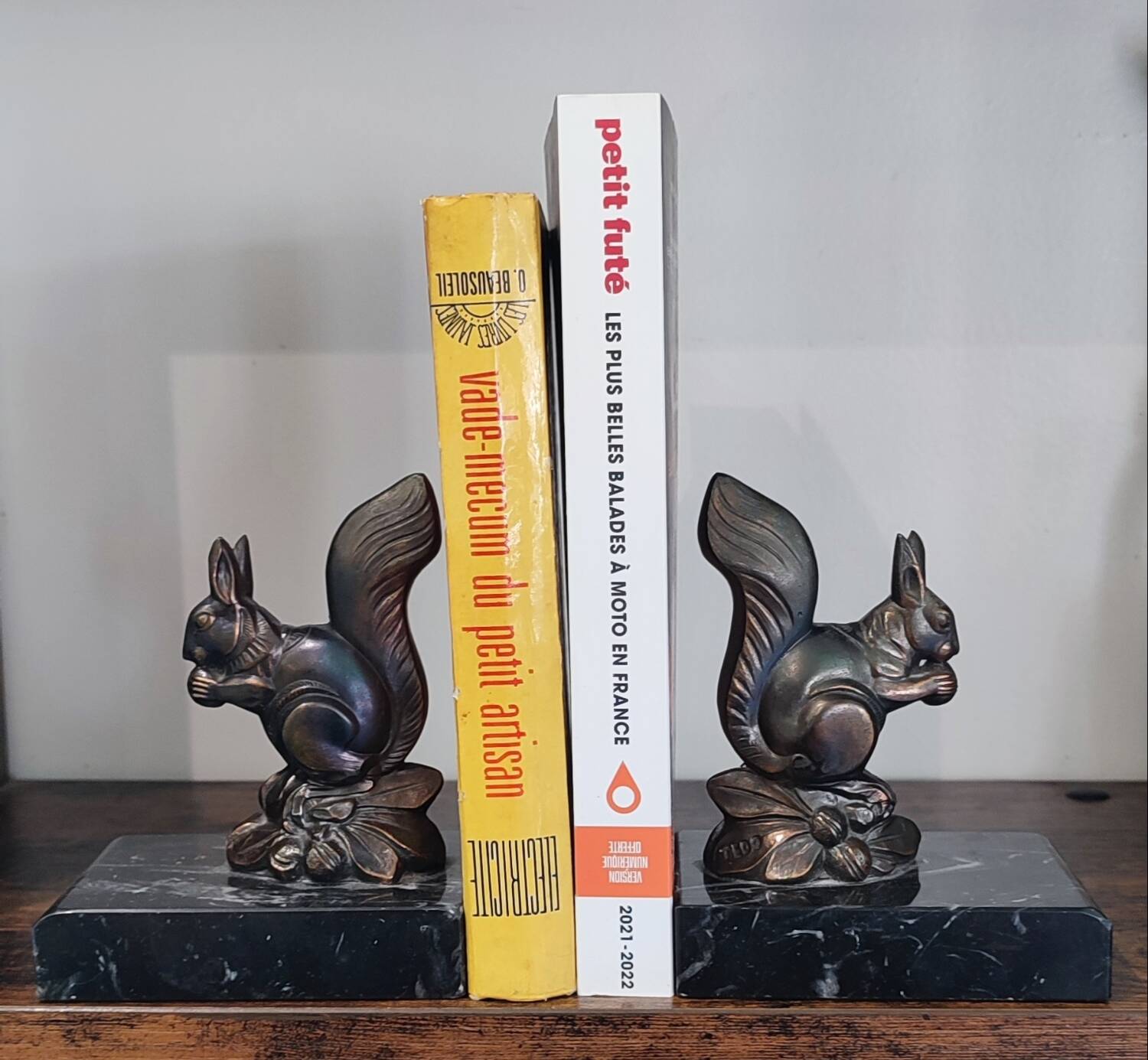 Squirrel bookends signed Tedo, Art Deco