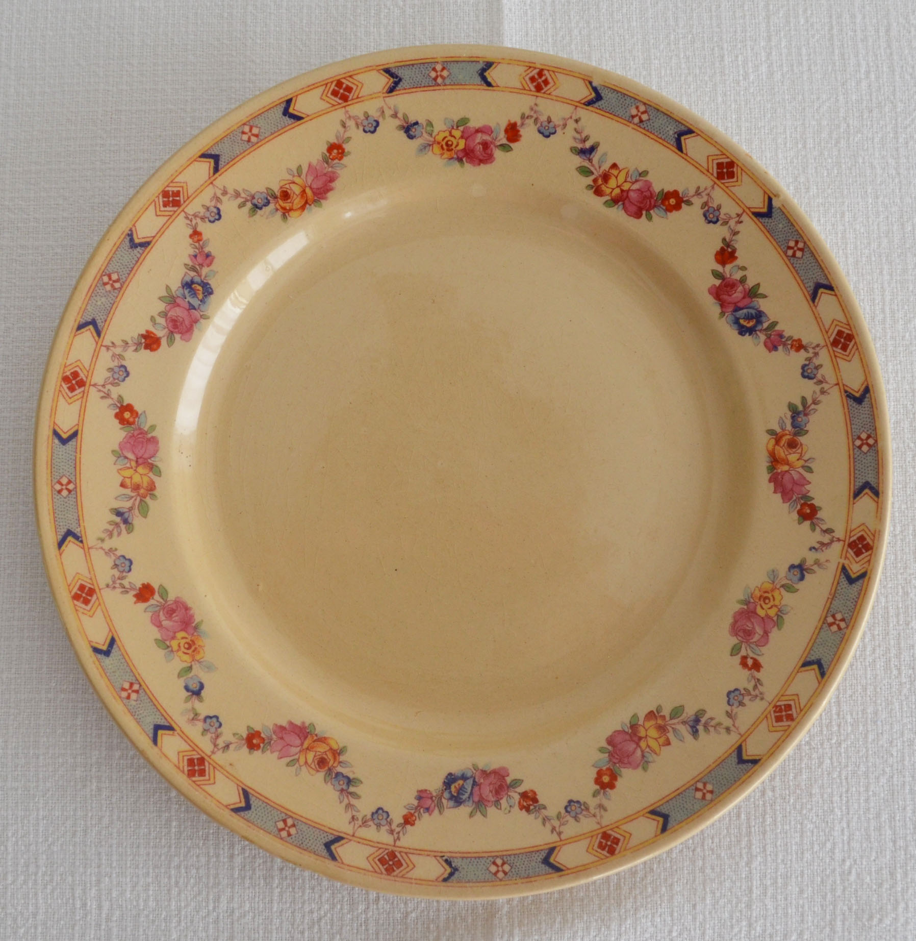 4 old flowered iron earth dessert plates