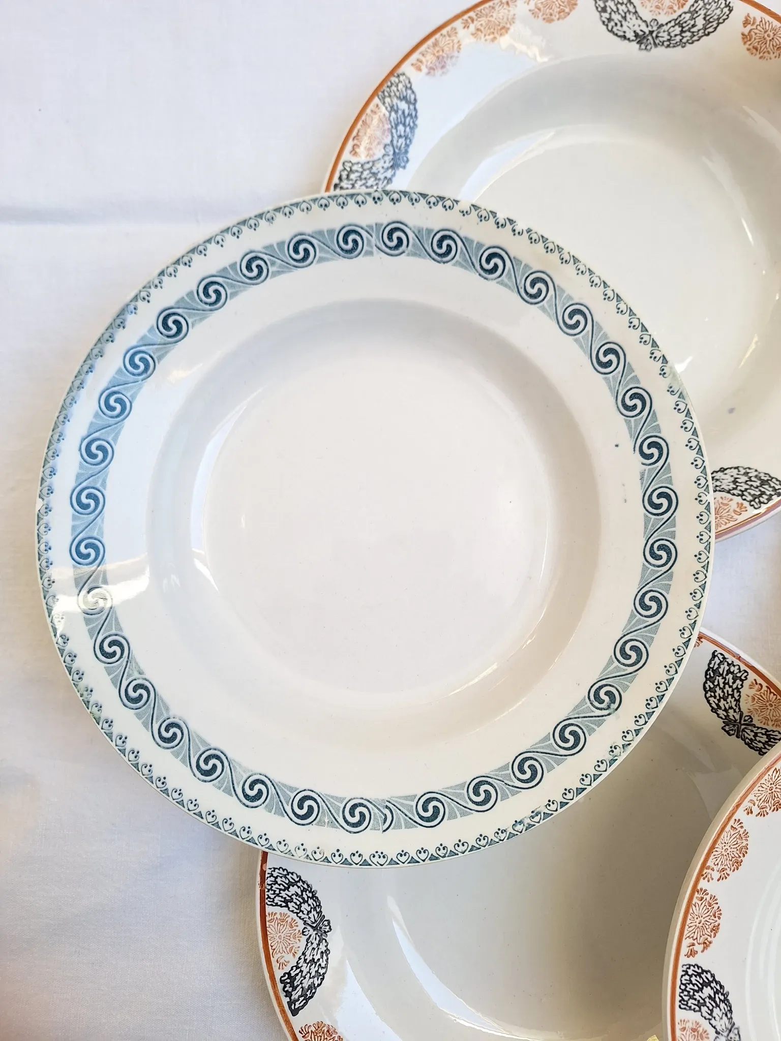 Orange and blue deep plates HBCM and St Amand
