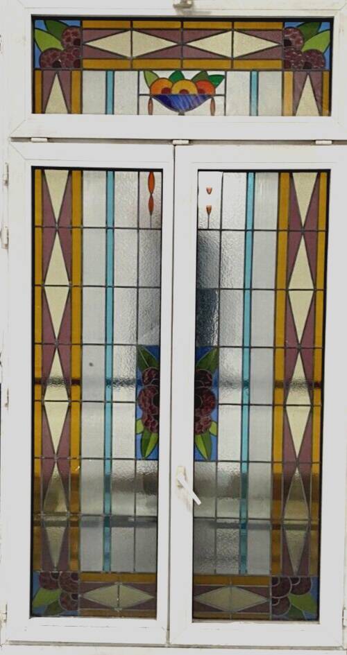 Pair of two-leaf windows in 20th century Art Deco stained glass